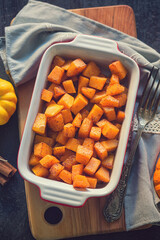 Pumpkin with honey and cinnamon baked in oven	
