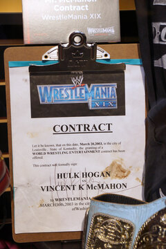  San Jose, California -  March 28, 2015: WWE Legend Hulk Hogan vs. WWE Owner Vincent K McMahon contract for match at WrestleMania 19 with a blood stain on displays at WWE Axxess event.