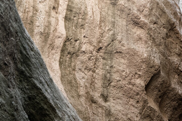 sunlight from above illuminating the white texured rocks in the Avakas gorge canyon in cyprus