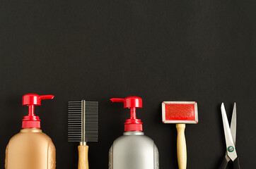 top view, flat lay on tools and products for dog grooming, combing, washing pet on dark background, copy space, place for text. black friday for petshop. discounts, sale. animal care
