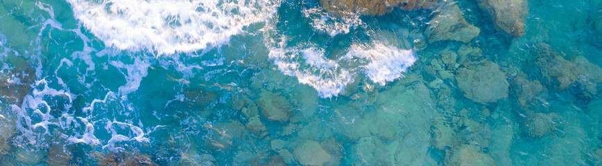 Fototapeta na wymiar Paphos Cyprus beach waves hitting the rocks
