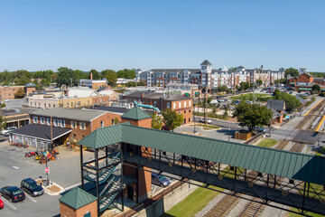Aerial view of Old Town Gaithersburg in Montgomery County, Maryland. A pedestrian footbridge...