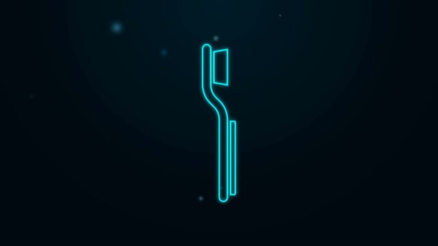 Glowing neon line Toothbrush icon isolated on black background. 4K Video motion graphic animation