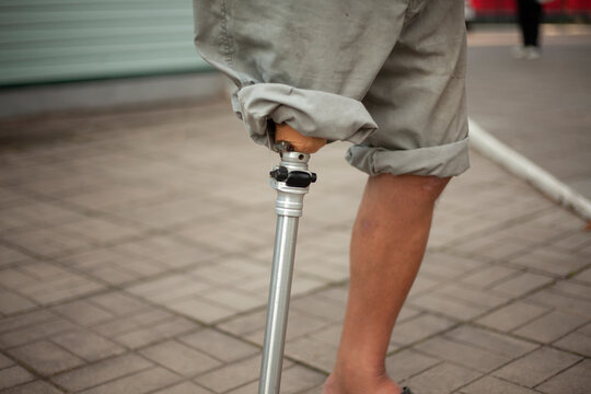 Metal prosthetic leg. Simple prosthetics for a man's leg.