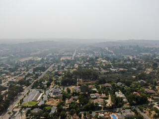 Fototapeta na wymiar Thick haze and smog over San Diego due to wildfire in California. USA. Air pollution.