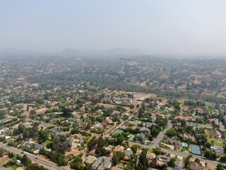 Thick haze and smog over San Diego due to wildfire in California. USA. Air pollution.