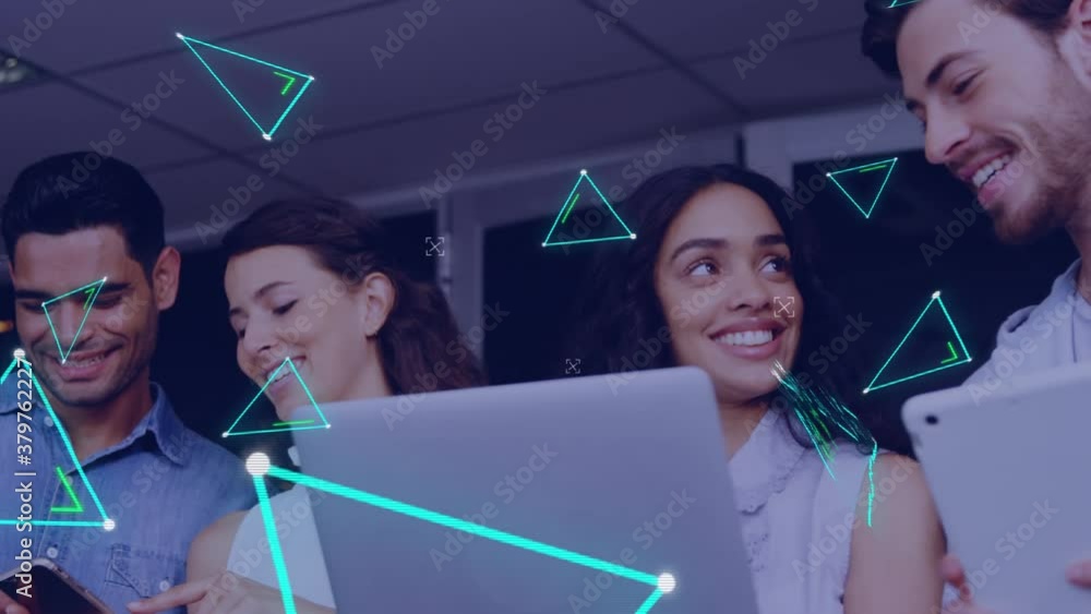 Poster multiple glowing triangles moving against office colleagues using electronic devices