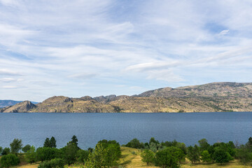 Fototapeta na wymiar Okanagan lake view at summer time with blue sky british columbia canada