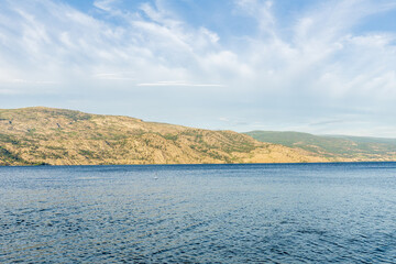 Okanagan lake view at summer time with blue sky british columbia canada