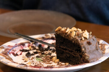 Elderly woman preparing baked and enjoying goods