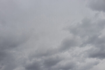 Gray rainy, covered with clouds, dark sky