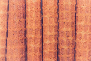 Toned and slightly blurred photo of Russian waffles closeup, texture of home waffles