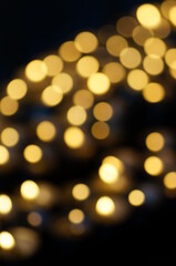 Background - golden flares and reflections on a black background