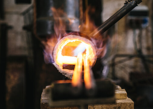 Steel poles coming out of a blacksmith_&Ocirc;&oslash;&Omega;&Ocirc;&oslash;&Omega;s gas forge