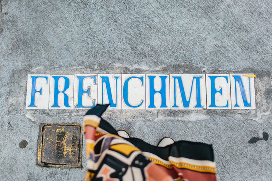 A woman walking on Frenchmen Street in New Orleans