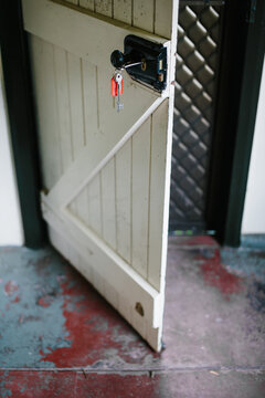 Keys hang from a farmhouse door