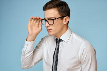 Business man white shirt tie glasses self-confidence official blue background