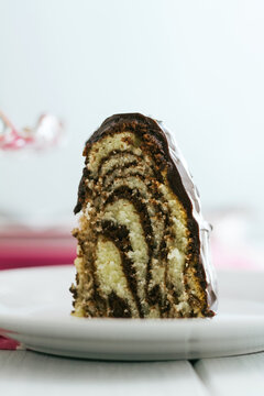 Zebra print chocolate bundt cake slice vertical