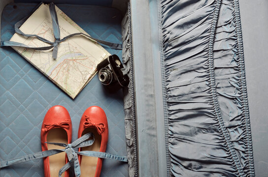old suitcase,flats,camera and map