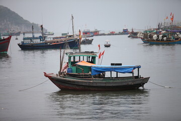 Naklejka na ściany i meble Floating Fishing Village In The Ha Long Bay. Cat Ba Island, Vietnam Asia. Cat Ba, Vietnam - March 5, 2020