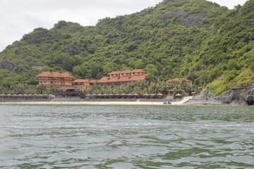 HA LONG BAY, VIETNAM - NOVEMBER 13, 2018: Halong Bay, Vietnam. Unesco World Heritage Site. Traditional tourist boats.