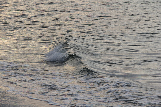 Small wave breaking