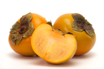 Fresh Persimmon fruit isolated on white