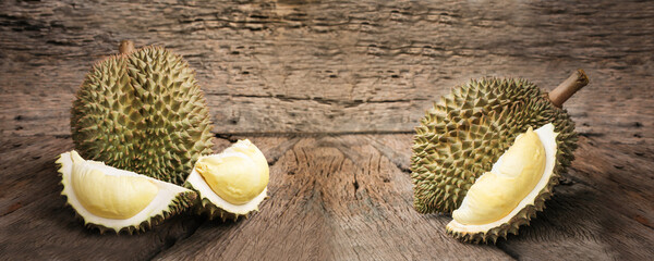 Durian riped and fresh, Durian peel with yellow color on old wood background. king of fruit from Thailand on summer season.