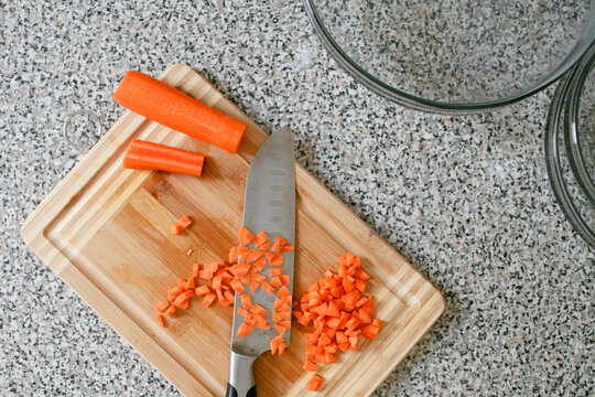 Chopped carrots on cutting board