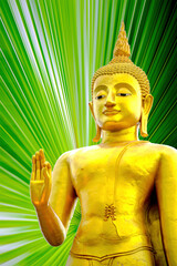 Obraz premium Buddha image on palm leaf