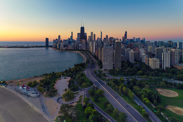 Chicago skyline at twilight. Road leading to the city by the Lake Michigan