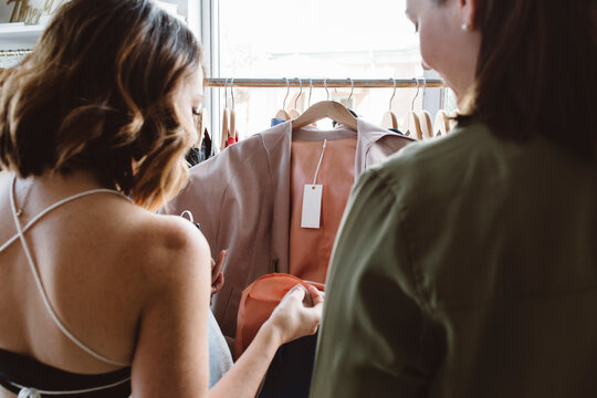 Friends shopping in clothing store