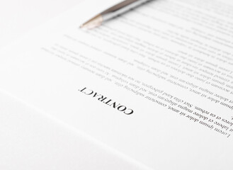 Pen lying on a contract or application form