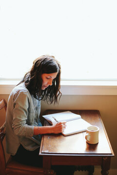 Hands Folded On Desk