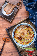 A bowl of Ouzao noodles with braised pork, a traditional snack in Suzhou, Jiangsu, China