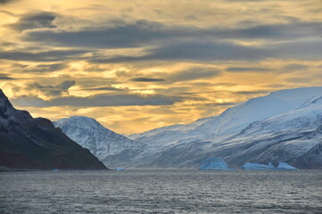 Fototapeta na wymiar Drifting icebergs. Global warming. Climate change. Antarctica, Arctic. Greenland