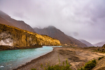 View enroute to Kaza through barren cold desert landscape of Spiti mountain valley located high in rain shadowed region of Himalayas in Himachal Pradesh, India.