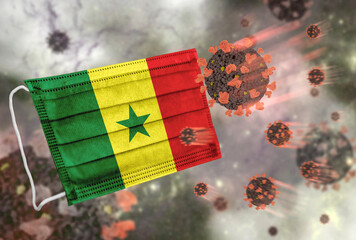 Face mask with flag of Senegal, defending coronavirus - 379806619