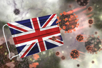Face mask with flag of United Kingdom, defending coronavirus - 379808276
