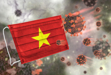 Face mask with flag of Vietnam, defending coronavirus - 379808632