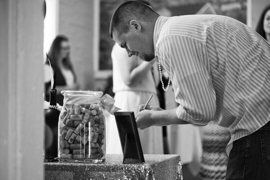 Shower: Man Tries To Guess Number Of Corks In Bottle