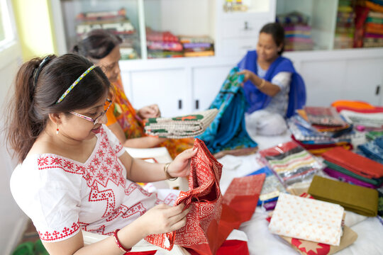 A Businesswoman deals with her client in a small shop