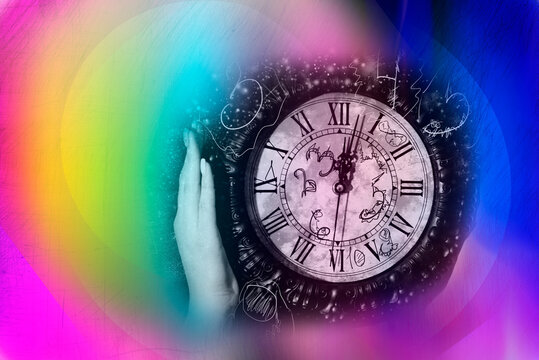 Wall clock on rainbow background