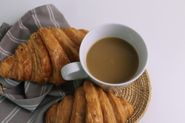Croissant with a cup of hot Latte