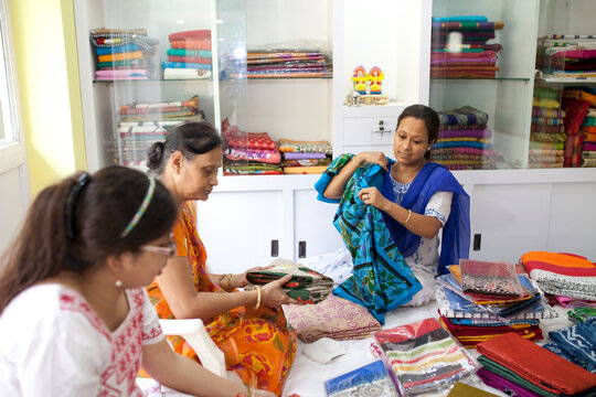A Businesswoman deals with her client in a small shop