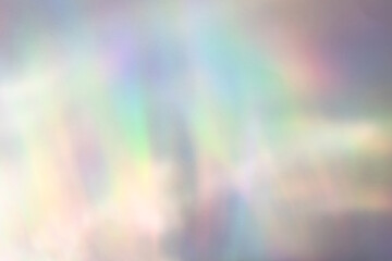 Blurred rainbow light refraction texture overlay effect for photo and mockups. Organic drop...