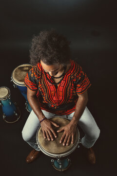 Cuban Musician Playing Bata Drums
