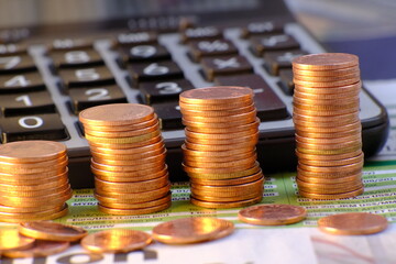 Stacks of gold money coin on table background and concept saving money