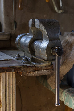 Old vise in a workshop