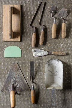 Masonry tools on stone background